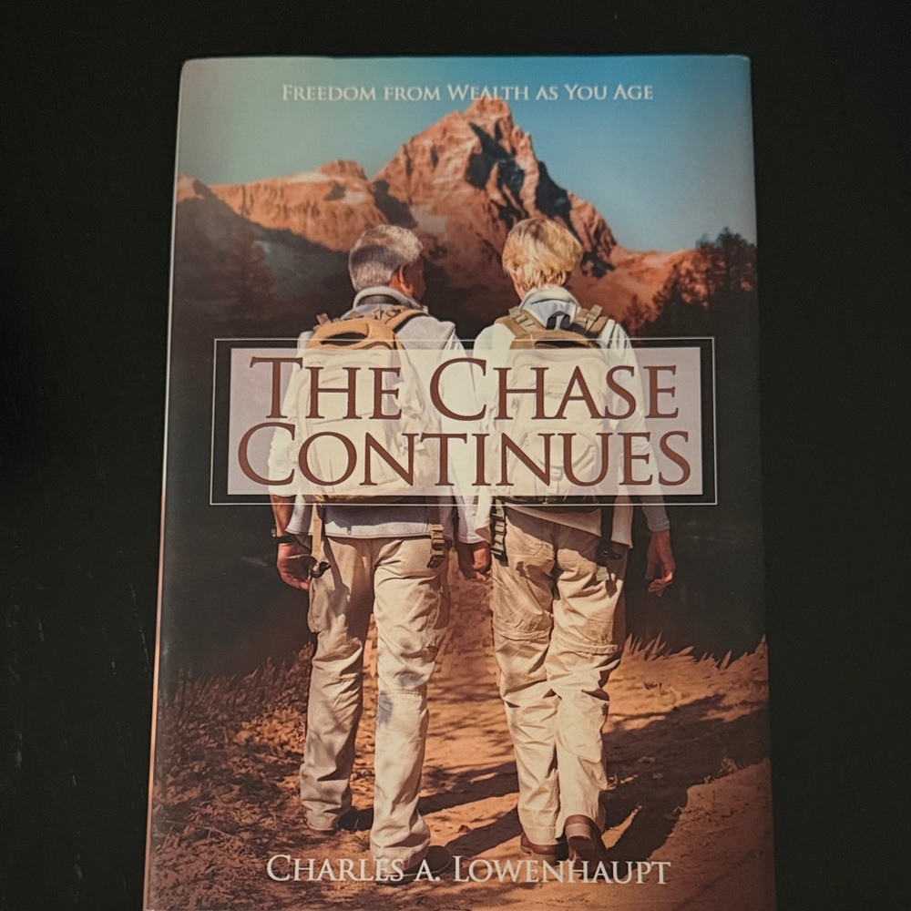 Indigo Book Cover The Chase Continues — Blue and Brown Landscape
